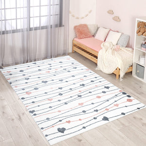 Tapis enfant rectangulaire blanc crème aux motifs guirlandes de cœur Ruby