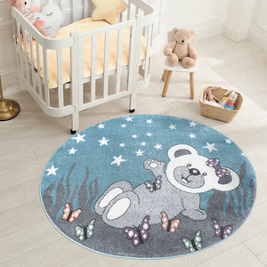 Tapis enfant bleu avec un motif d'ourson sous les étoiles Ruby