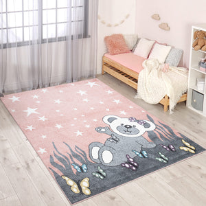 Tapis enfant rose avec un motif d'ourson sous les étoiles Ruby