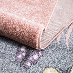 Tapis enfant rose avec un motif d'ourson sous les étoiles Ruby