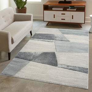 Tapis contemporain aux motifs abstraits graphiques gris Liah