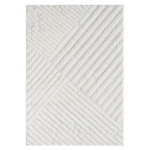 Tapis à motif discret en relief crème - MADI Madi