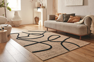 Tapis aspect jute abstrait noir PALMA Bruge Interiors