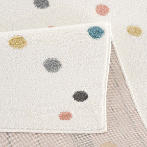 Tapis enfant blanc crème avec des confettis colorés Ruby