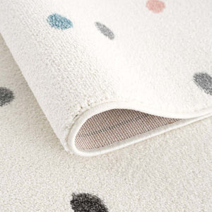 Tapis enfant blanc crème avec des confettis colorés Ruby