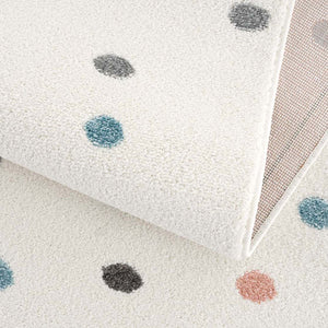 Tapis enfant blanc crème avec des confettis colorés Ruby