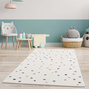 Tapis enfant blanc crème avec des confettis colorés Ruby