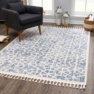 Tapis scandinave bleu et crème avec des franges tressées Nora