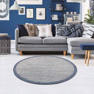 Tapis bleu à franges tréssées style scandinave bleu avec motif lignes blanches Nora