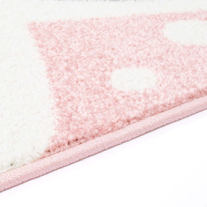 Tapis enfant rose avec un motif de tête de lapin _ HUGGY Huggy