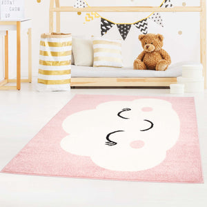 Tapis enfant rose avec un motif de nuage souriant - HUGGY Huggy