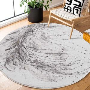 Tapis motif abstrait artistique gris avec une pointe de doré - PRIA Pria