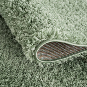 Tapis vert uni à franges - BELISE Belise