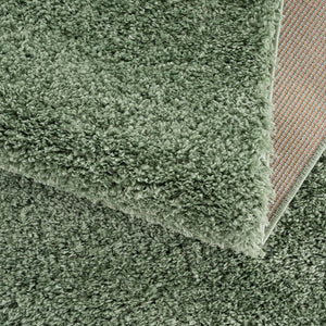 Tapis vert uni à franges - BELISE Belise