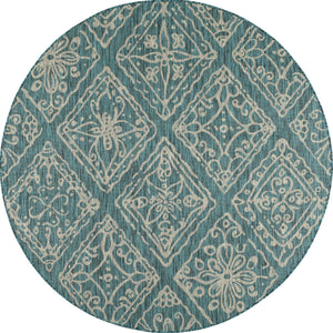 Tapis rond turquoise motif ornement floral Bruge Interiors