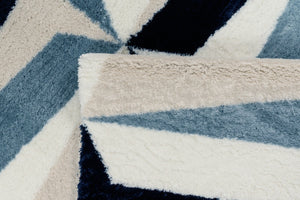 Tapis graphique bleu, ivoire et beige Bruge interiors