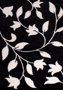 Tapis motif fleur noir style moderne Bruge interiors