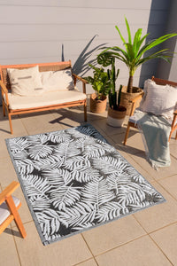 Tapis motif floral noir et blanc Nazar rugs